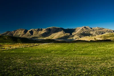 Mountain Range With Green Meadow Near Wanaka, New Zealand., Peter Wey